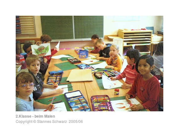 Group of second class pupils while painting