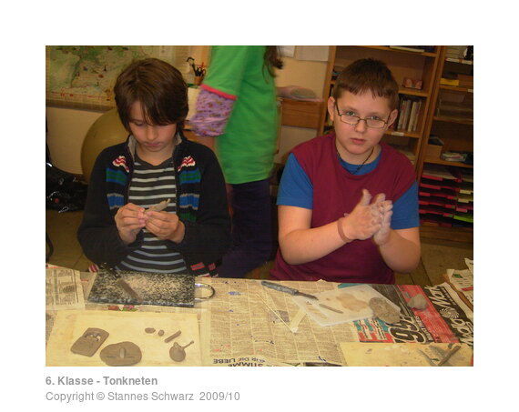 Two 6th class pupils moulding with clay