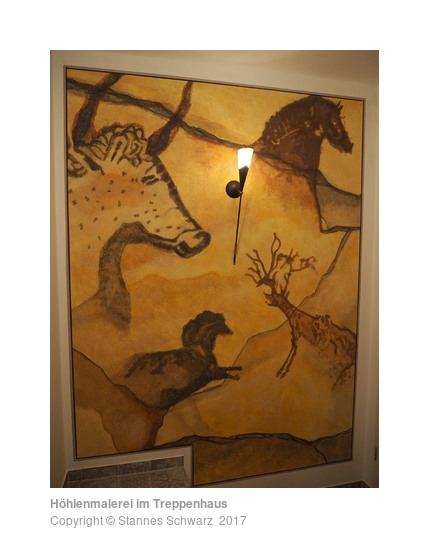 Stonage painting of several animals