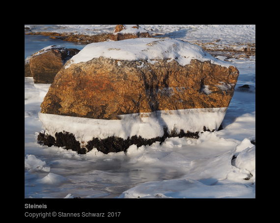 Stone in frozen sea